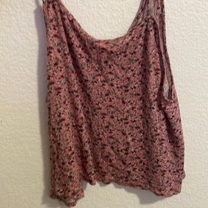 This is a LA hearts loose fitting tank. Size in inaccurate but fits small/medium